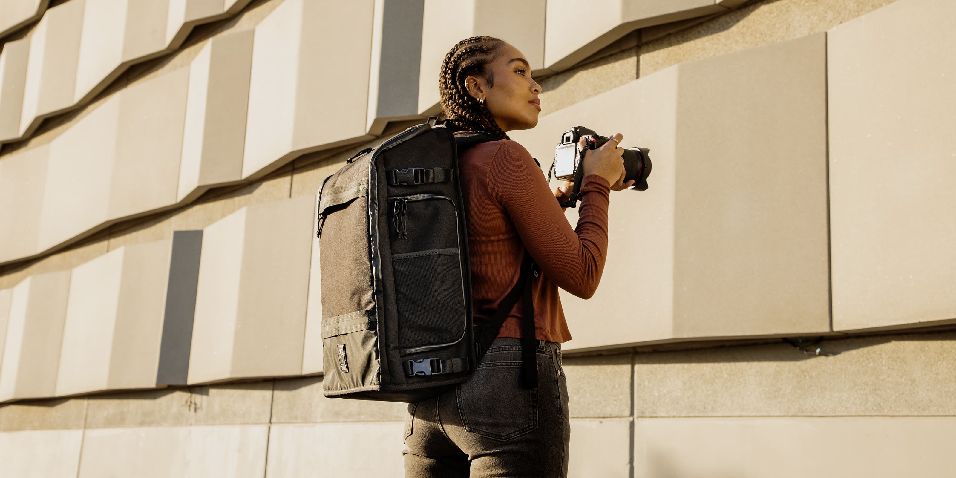 Niko Camera Backpack worn by a photographer larger desktop image size