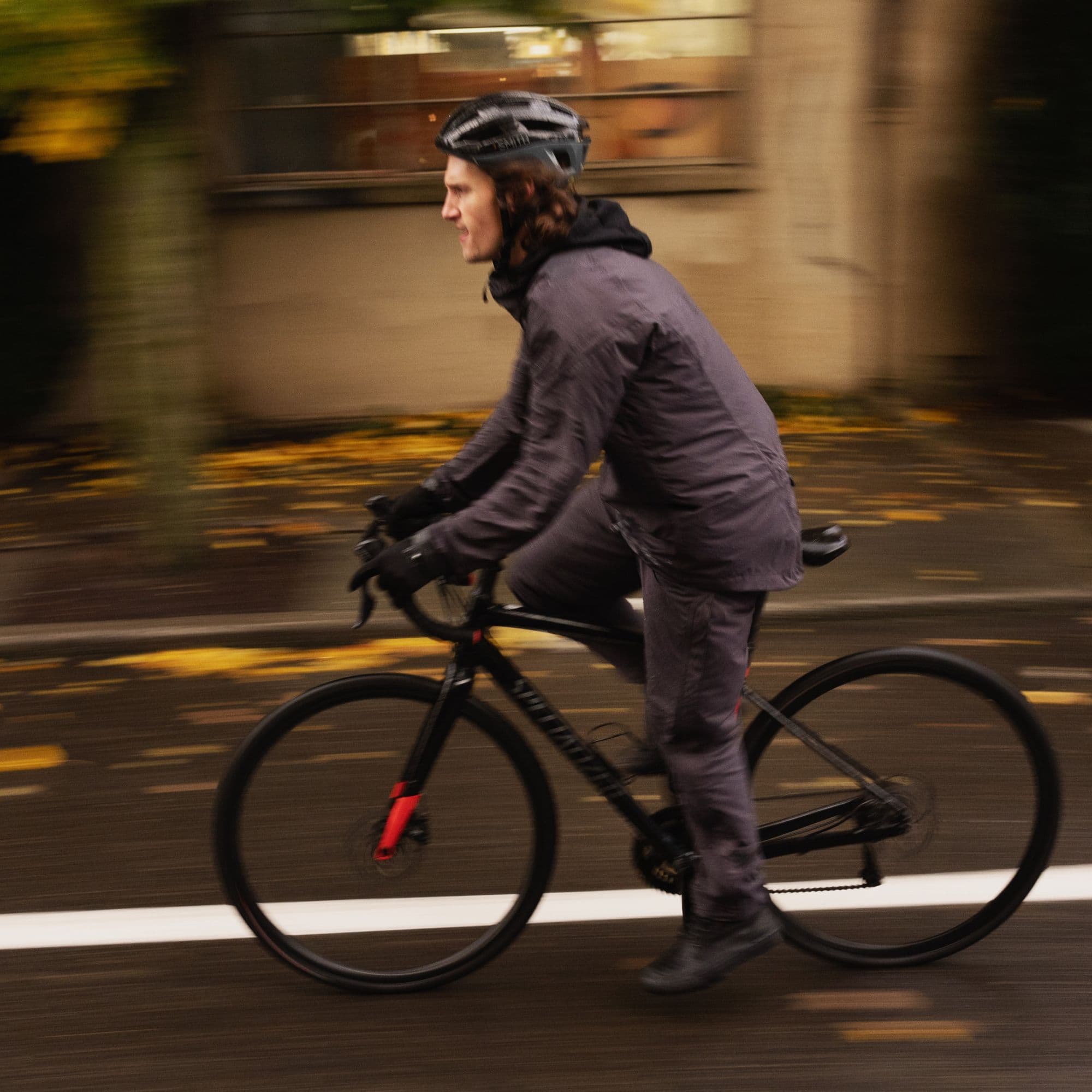 The Chrome x Rab jacket and pants in action on a bike