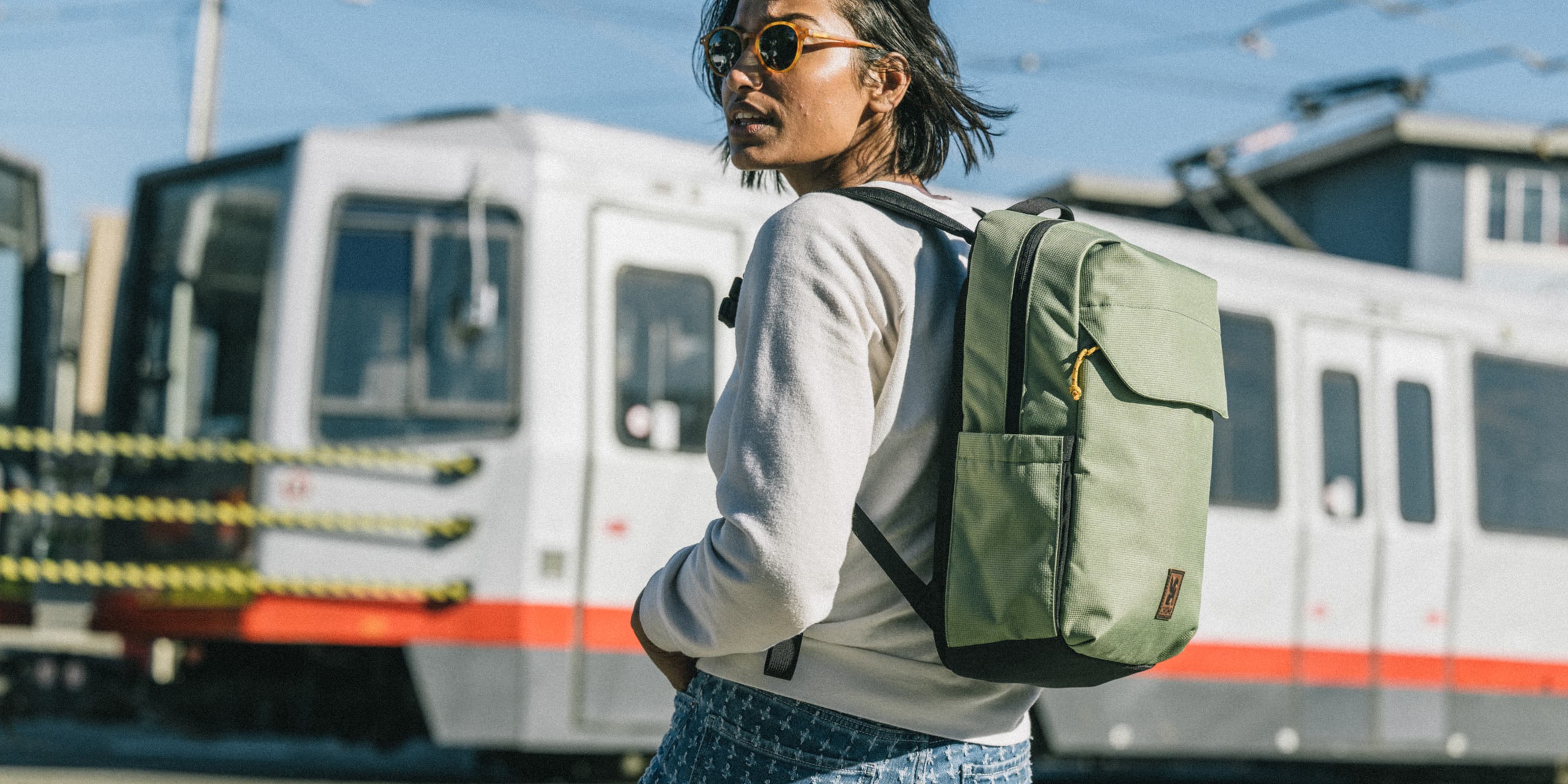 Water-resistant Ruckas 14L Backpack in green worn by a person