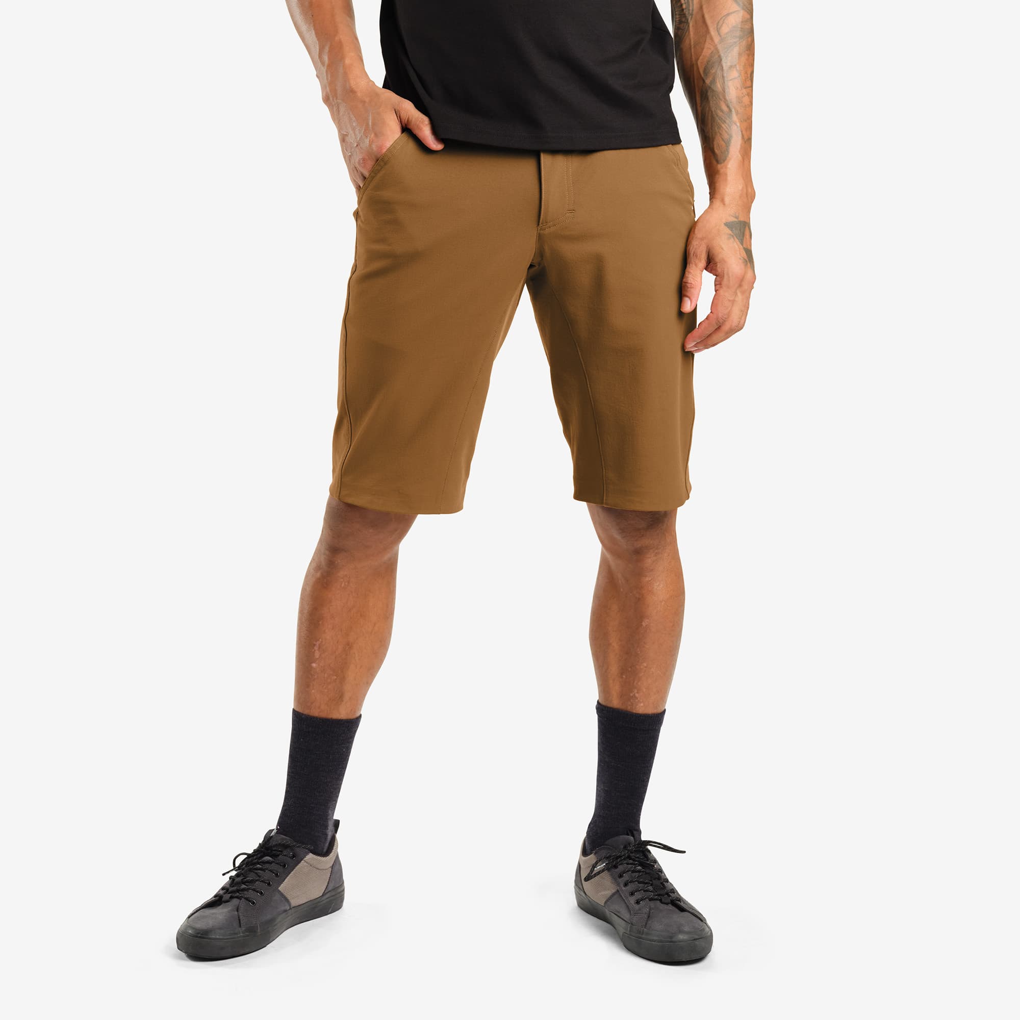 Men's tech Sutro Short in brown worn by a man #color_monks robe