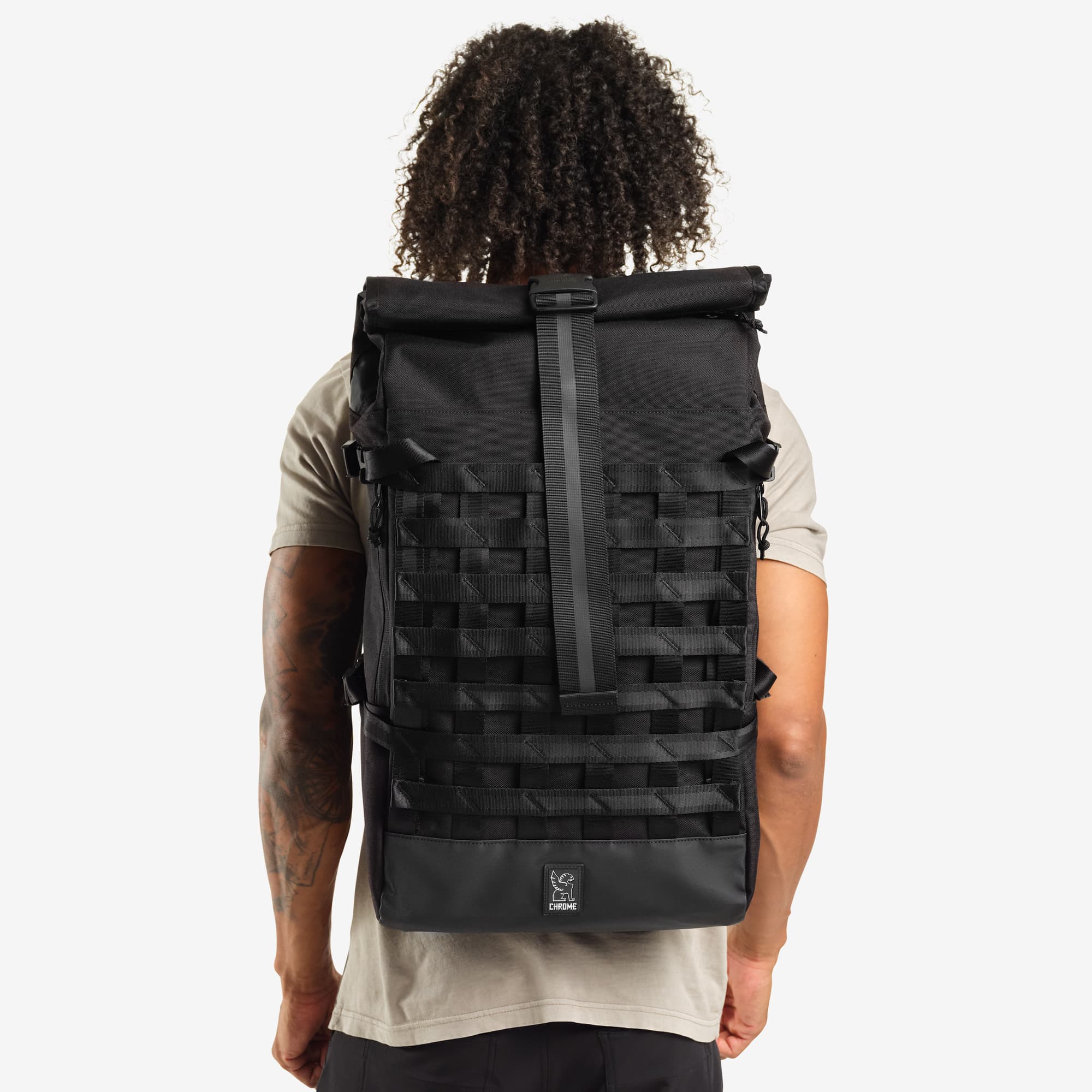 Black Barrage Freight Backpack on a person