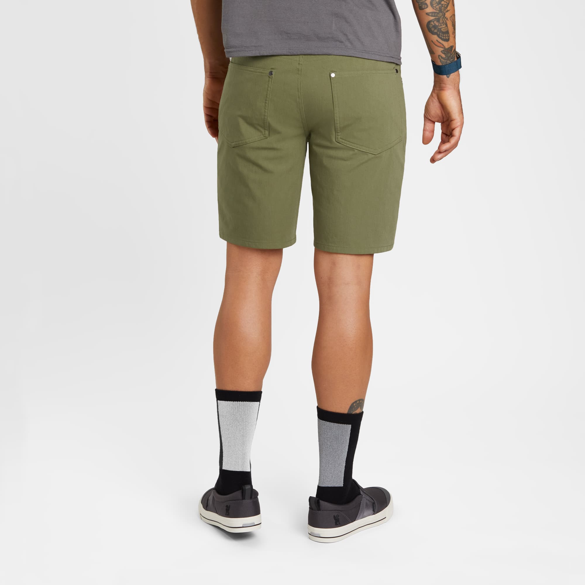 Men's Madrona tech 5-pocket short in green worn by a man back view #color_olive branch