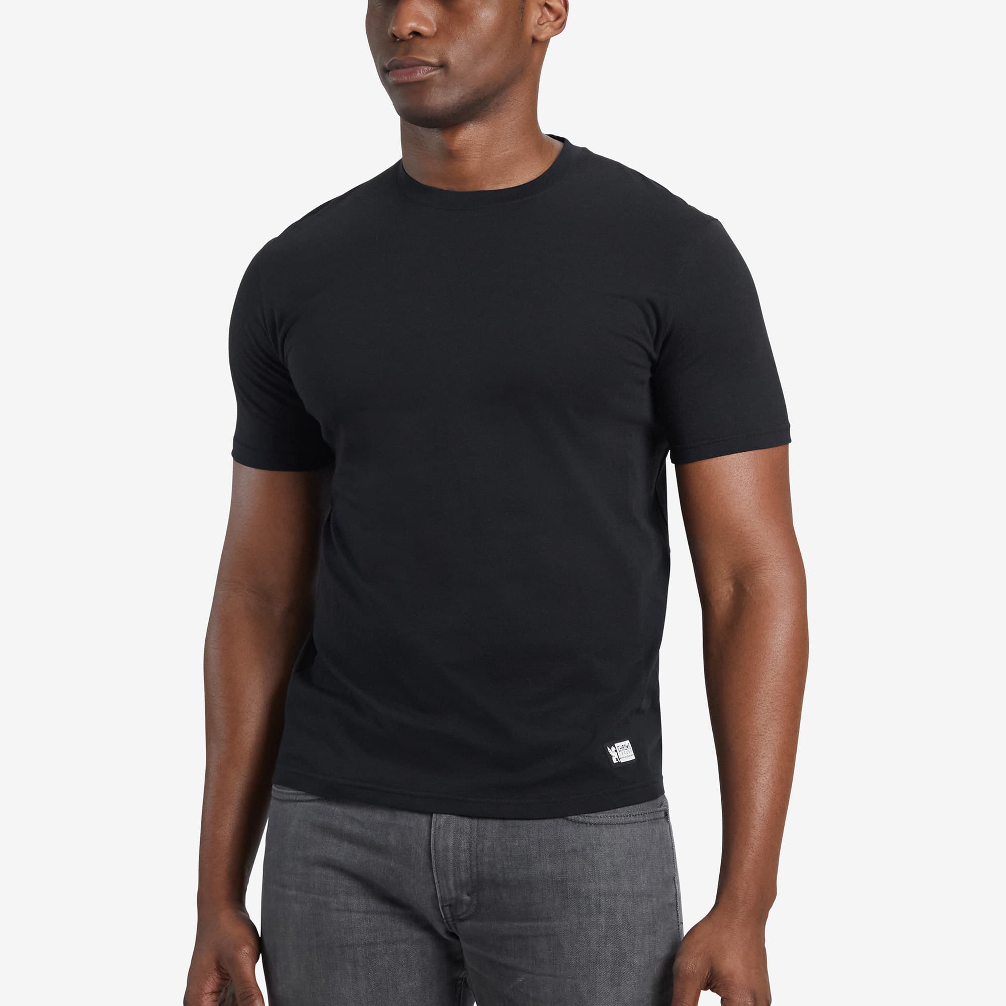 Men's Chrome basics T-shirt short sleeve in black worn by a man #color_black