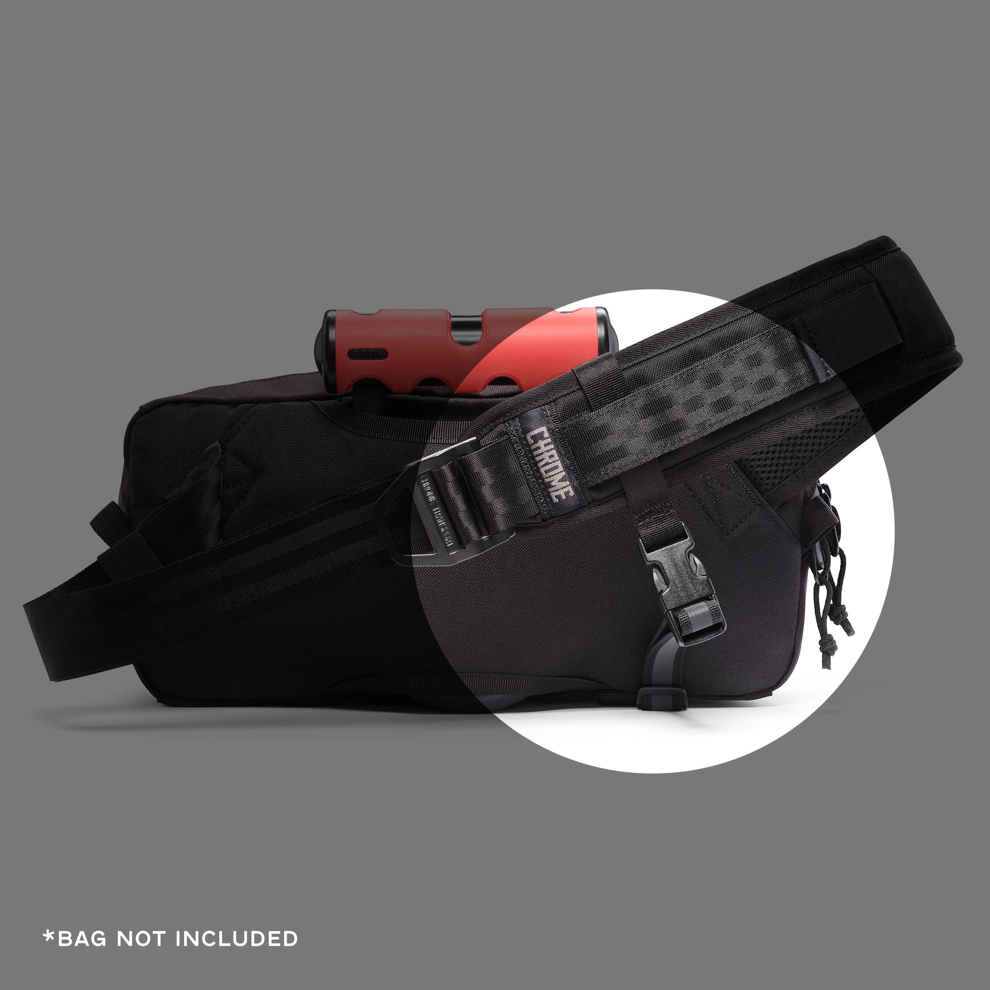 Stabilizer Strap for the Mini Kadet attached to a bag #color_black