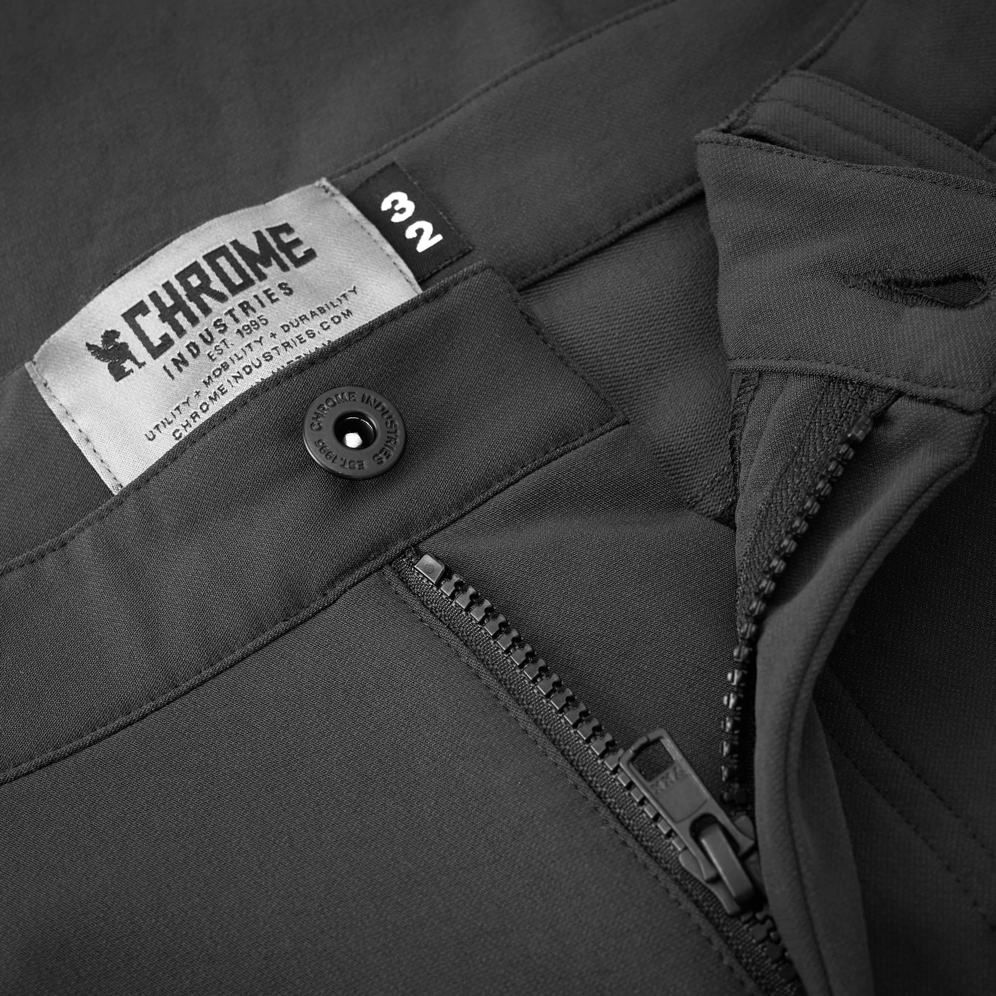 Men's Brannan tech Pant in black button & zipper detail #color_black