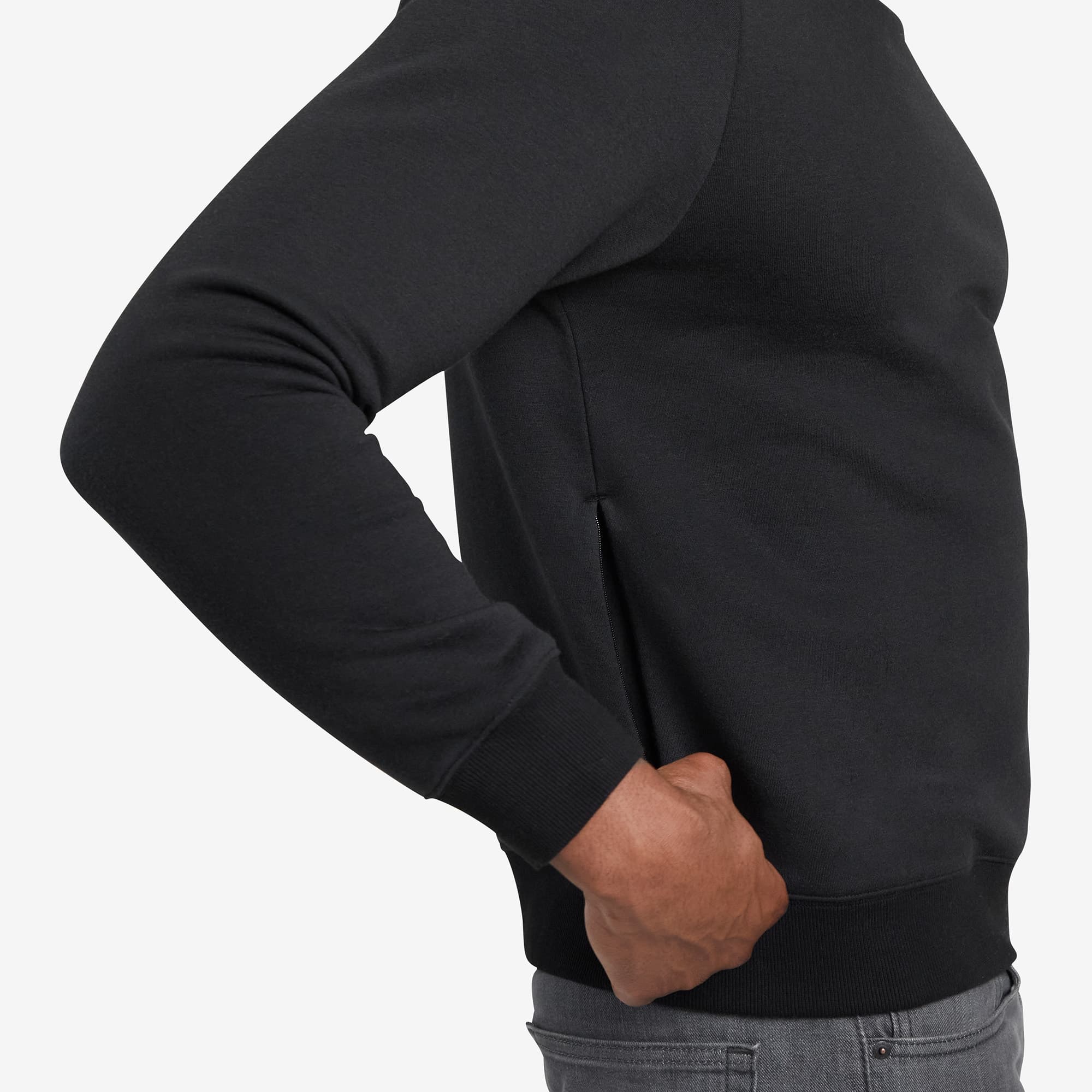 Side zipper view fleece Crewneck Sweatshirt on a man #color_black