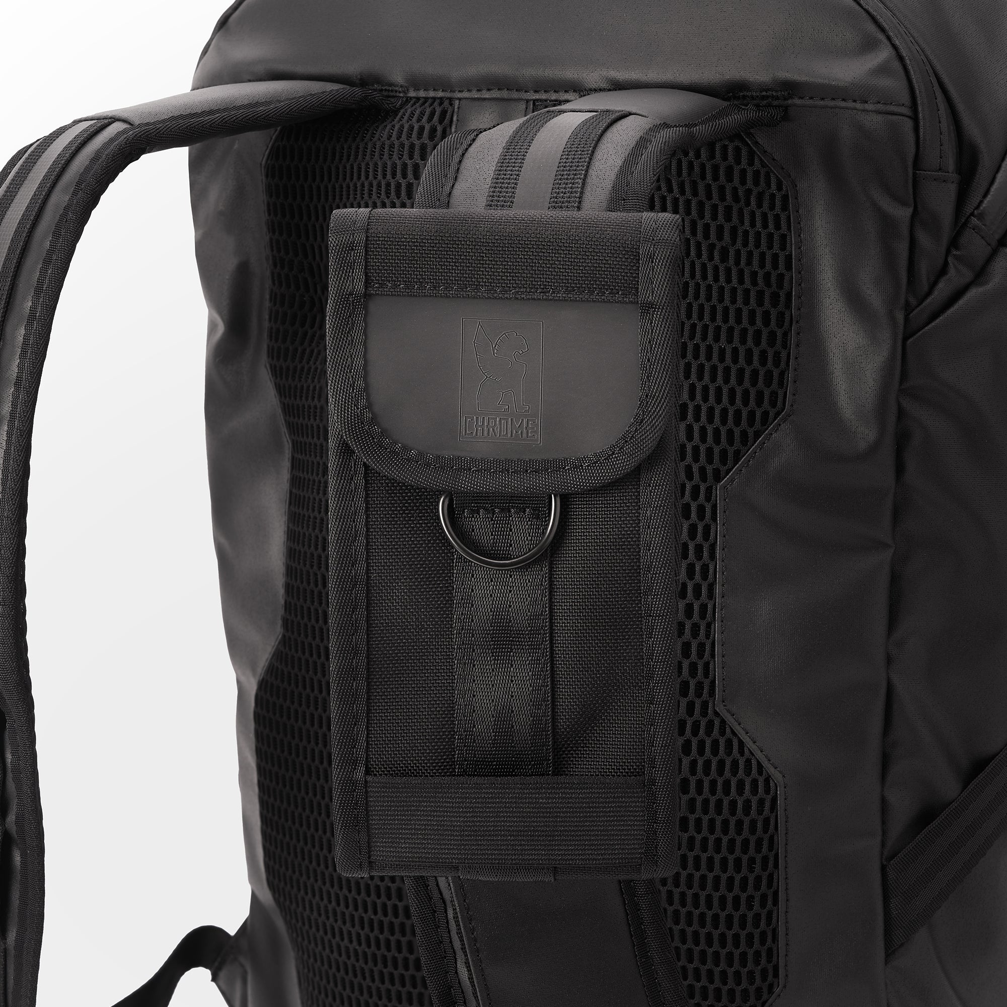 Large Phone Pouch in black attached to a backpack strap