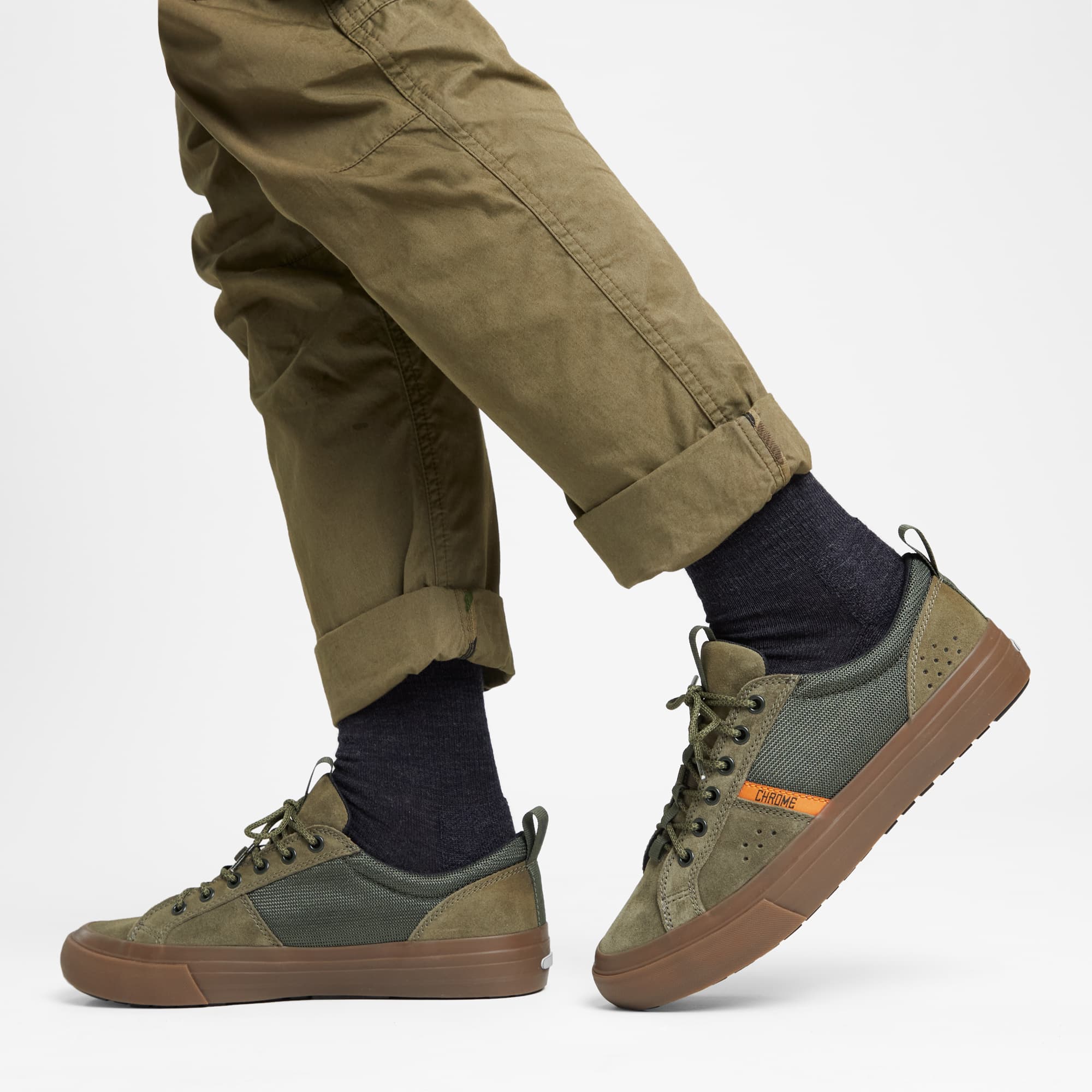 Kursk Trail Sneaker in earth gum worn by a man #color_earth/gum