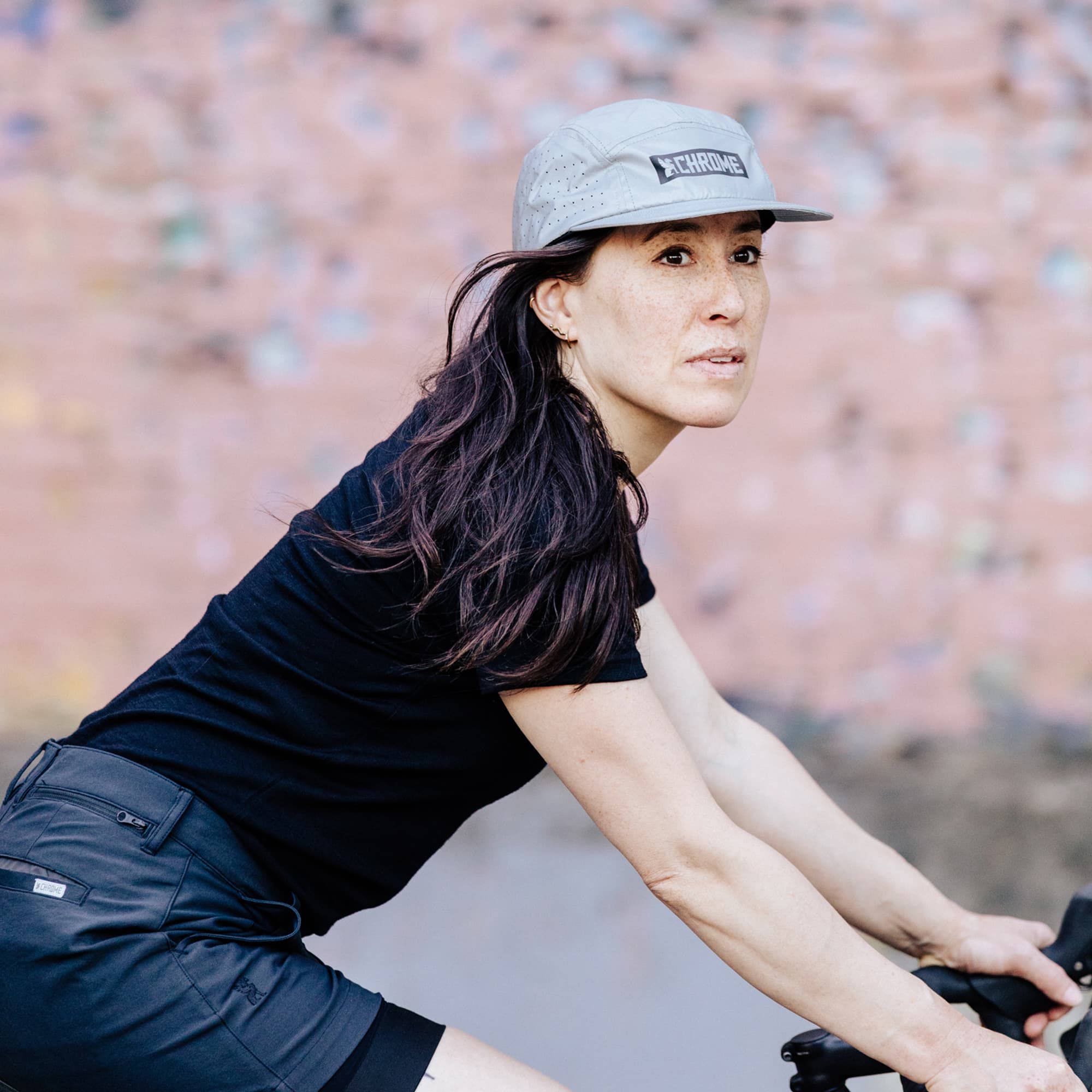 5-Panel Reflective Hat worn by a woman