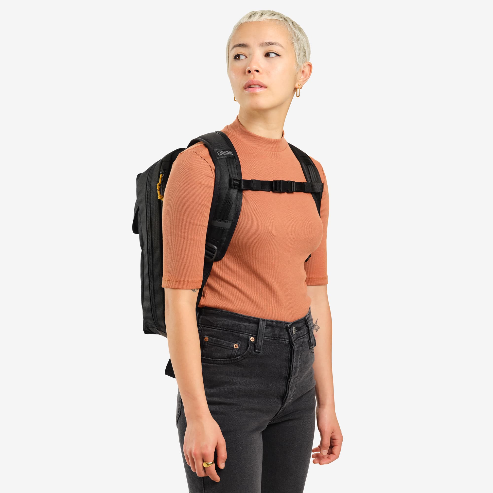 Ruckas 14L Backpack in black worn by a woman front view