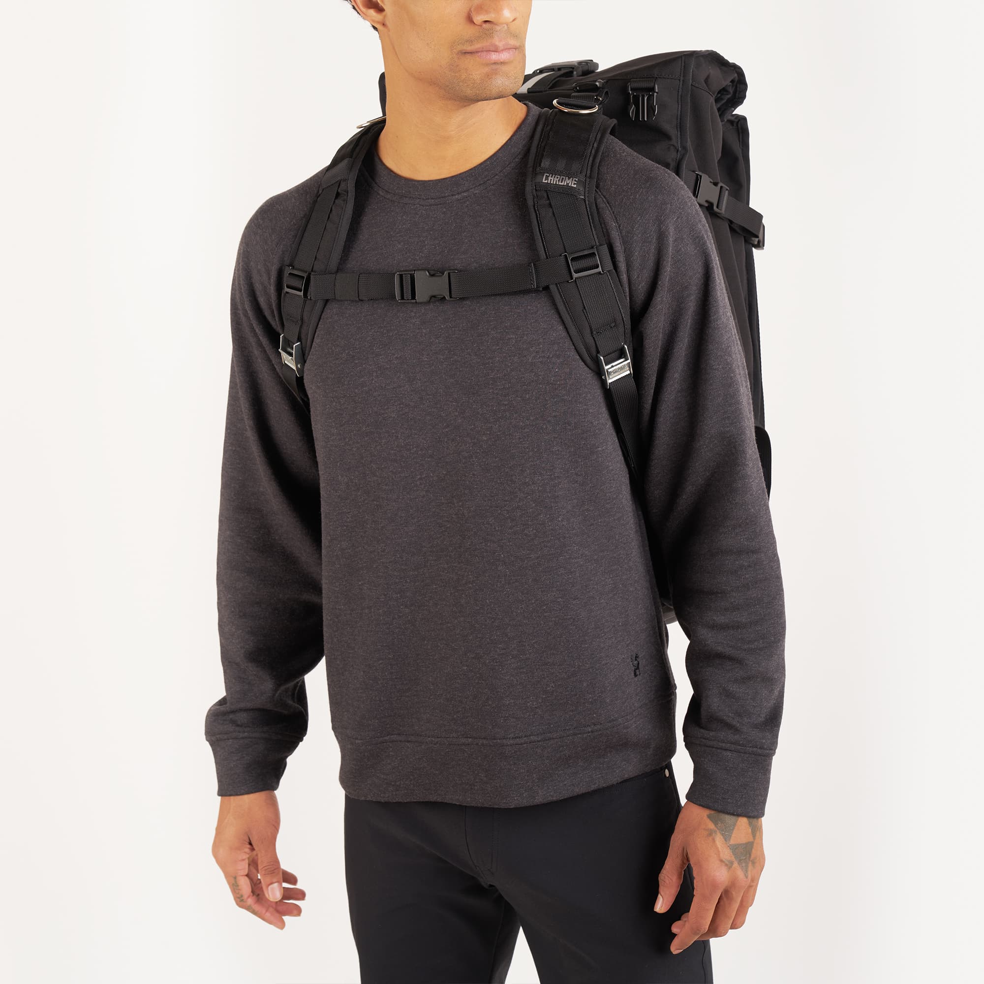 Black Barrage Pro backpack on a man front detail #color_black/red